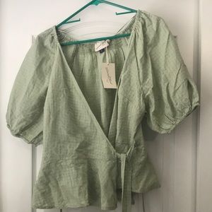 green cross over shirt!